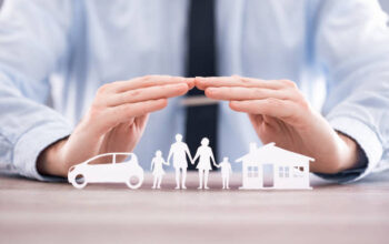 Insurance protecting family health live, house and car concept. Cut elements from paper that symbolize the coverage.